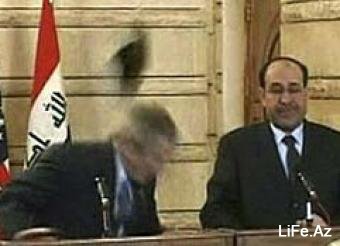 В Багдаде в Джорджа Буша швырнули ботинки - [Фото]